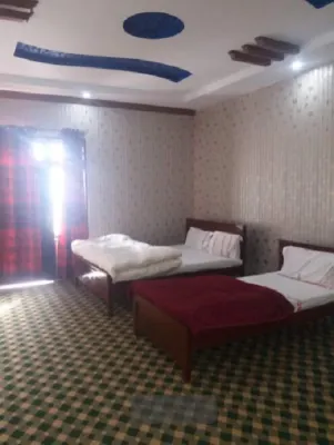 Hotel Happy Hut Hotels near Shangla Top