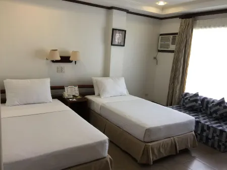 Soledad Suites Отели в г. Тагбиларан