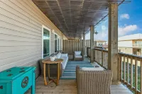 Luxury Beachfront Condo with Covered Deck Steps From Beach & Golf Cart Rental - 4-Star