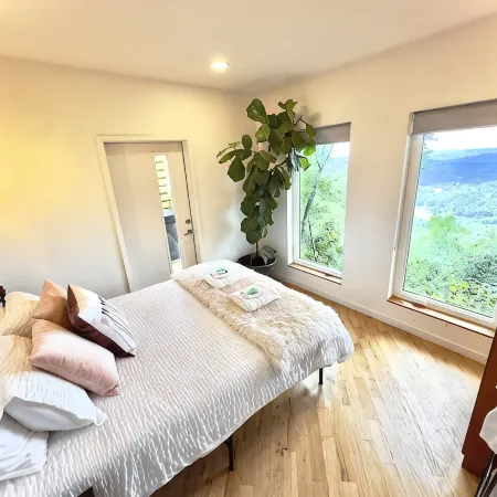 Two Bedroom Modern Tiny House with Bluff Views, Huge Windows!