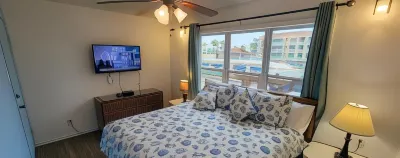 Beach Access Condo Nice Pool/Hot Tub Area w/BBQ 2 Bedroom Home by RedAwning