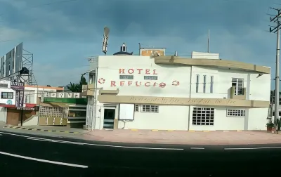 Hotel El Refugio Отели в г. 