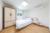 Gangneung Pogni 鄰近沙漏公園的酒店