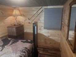 Cozy one-bedroom cabin nestled in the woods beside Stonewall Jackson Resort.
