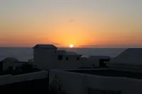 Tranquil setting, sea view, heated pool & Hot Tub, sub-tropical garden. - Ocean View