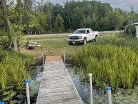 Cute Cabin on Big Pine Lake with a Large Fenced Yard and Lake Access Hotels in Pine County