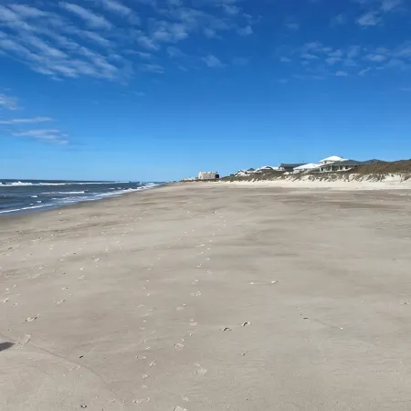 Spectacular partial ocean view 2BR 2BA large top floor condo-beachfront complex!