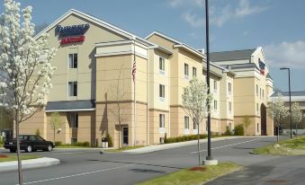 a fairfield inn and suites hotel is shown in the city , with trees and street signs visible at Fairfield Inn & Suites Worcester Auburn