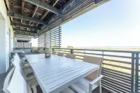 Luxury building with pond view and parking