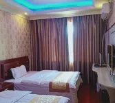 Tongren Times Business Hotel - Inns
