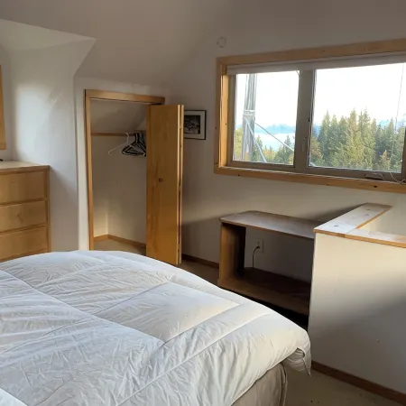 1 bed, 1 bath, breakfast included, full kitchen, washer/dryer, and rental car.