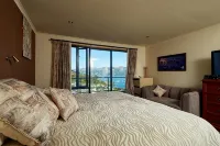 Akaroa Holiday Home.  Spacious, sunny, harbour views and close to town. Sleeps 8
