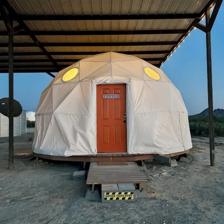 Southern Boho inspired Geodesic Dome nestled up next to Big Bend National Park.