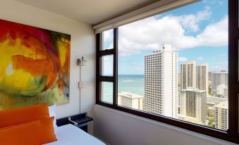 Artsy 32nd Floor Condo with Modern Furnishings & Gorgeous Ocean Views Condo