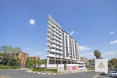 Kmg Apartments at the Apex