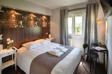 Hotel les Negociants Отели в г. Валанс