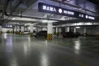 Taoxichuan Traders Hotel - parkir