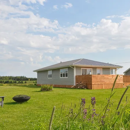 Renovated family cottage; walk to amazing beach, short drive to golf & town
