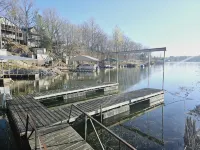 New! Modern!  Fire Pit!  Paddle Boards! 5 Bedrooms! On the water! Boat Dock!