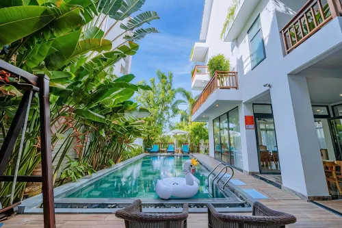 Palm Riverside Boutique - en bord de mer