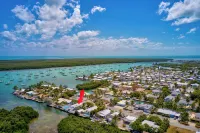 Harbor Hideaway - 3bed,2bath,50' dock, heated pool, tiki with all the amenities. - ที่มีฟิตเนส