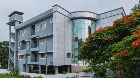 Woodside Residency Отели в г. Кумили