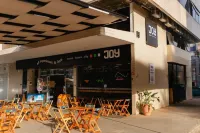 Joy Hostel & Suítes Hotel a