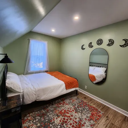 This is a private second-floor suite with its own entrance.