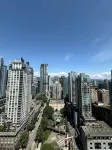 City Views | Prime Downtown Stay w/ Pool, Gym + Walk to Robson & Dining - Condos