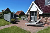 Dream vacation home NordseeStar with fireplace and lounge in Neßmersiel - 3-Star