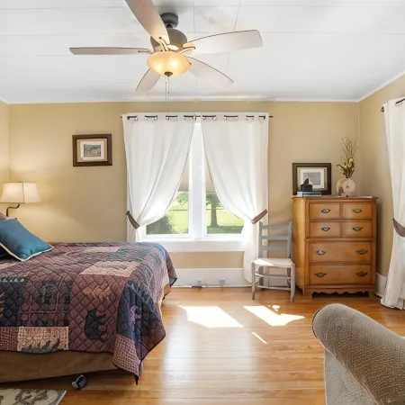 Historic Early Settler Farm House that Has Been Modernized For Your Comfort.