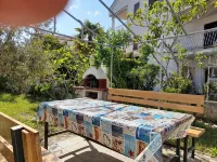 Apartment Tihana with 2 bedrooms and garden view, family-friendly