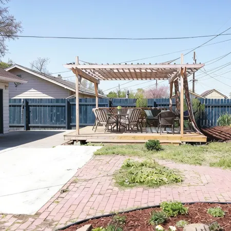 Family home, fully fenced yard with covered deck. Walk to trails and parks.
