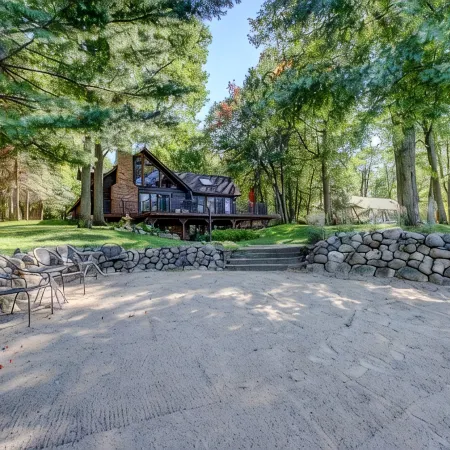 Whitefish Chain Lake Home with Beach + Sauna + King Beds + Kayaks +Paddle Boards