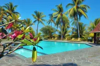 Puri Bunga Beach Cottages - Havudsigt