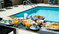 Olympos Suites Apartments - Beach