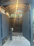 Mentone glamping getaway in a  private screened in cabin in charming Mentone