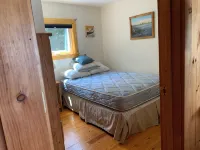 This beautiful cottage is set back 25 feet from Bog Lake in Northfield, Maine!