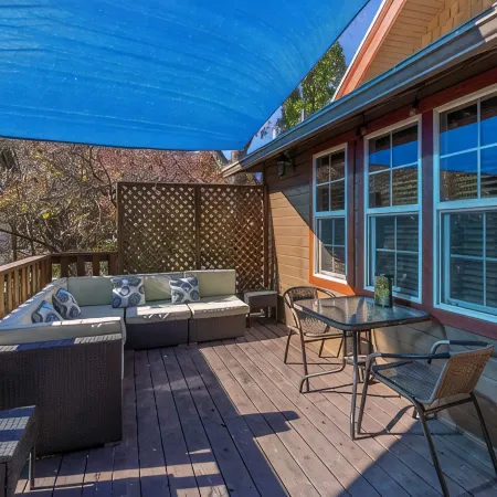 WALK EVERYWHERE!  4 BEDROOMS +BONUS RM & QUAINT BACKYARD
