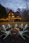 Enchanting 5-Bed/5-Bath Lakefront Log Cabin with Private Cove, Beach & Hot Tub.