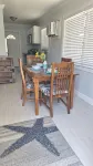 Beach time! Walk/Bike to Beach,Restaurants,Shops,fenced large backyard-sleeps 4 - Wi-Fi