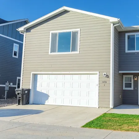 3-bedroom townhome with patio and attached 2car garage, close to hospitals