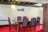 Camelot Motor Lodge - Moteles