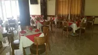 賈姆博旅行者飯店 - 早餐