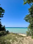 4bd/5ba Luxe Log Cabin - Sunset View of Torch Lake, Hiking Trails, Premier Golf - 5 estrellas