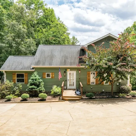 Lakefront Private Cove Retreat w/ Sandy Beach, Dock, Hot Tub + Boat & Ski Option