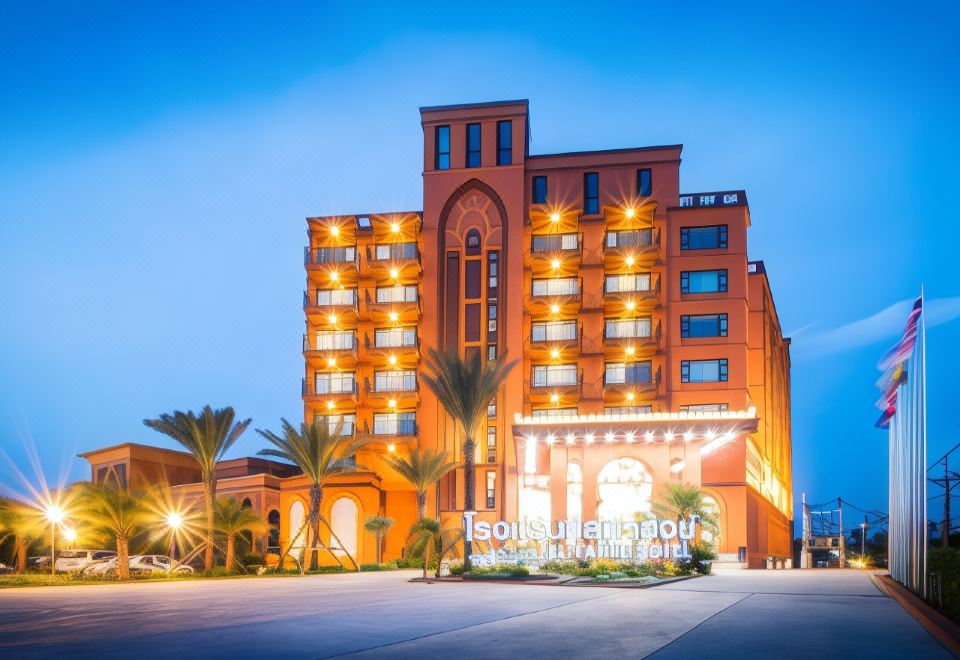 "a large , modern building with multiple floors and a sign that reads "" concerto hotel "" prominently displayed on the front" at Alfahad Hotel