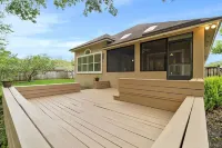 Four-bedroom mini estate, minutes from downtown Jax with a sunroom and backyard