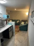 Luxurious Living Room and Kitchenette - Modern Oasis Hotels in Sodus Point
