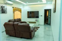 Cozy 2-bedroom apartment in beautiful Lome with AC, WiFi, security agent